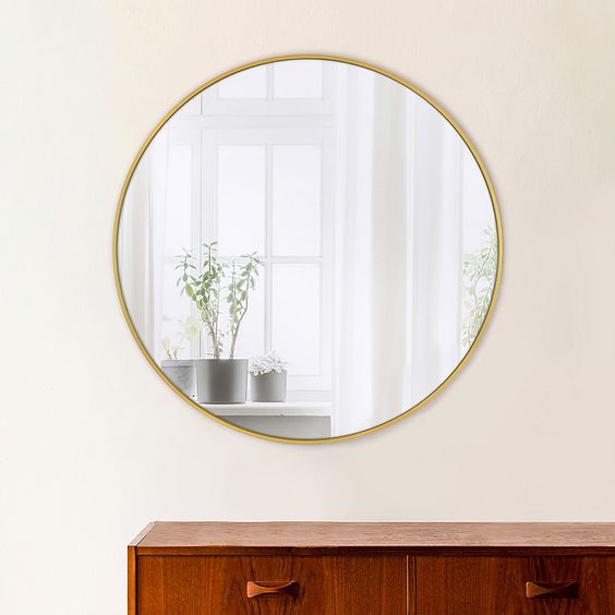 Espejo  circular dorado 70 cm